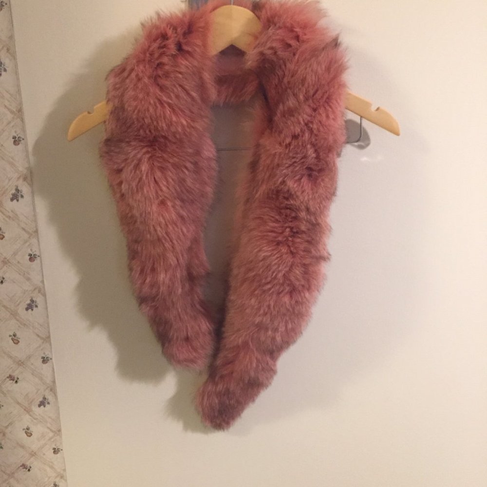 Real fur fox in pink color.